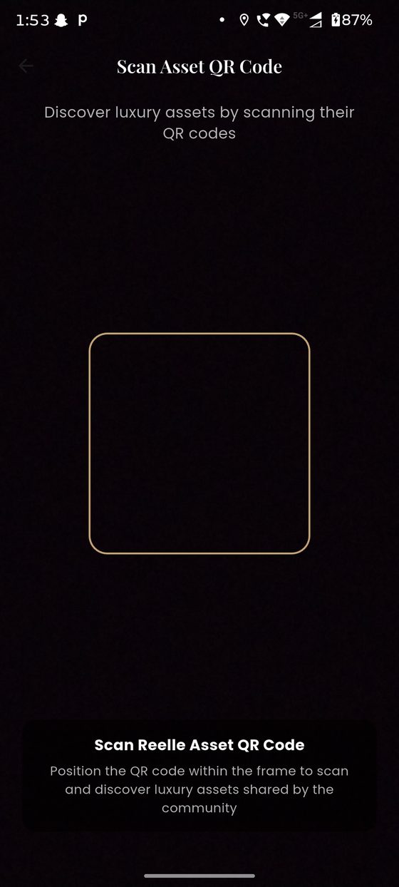 QR scanner reading a Reelle asset badge